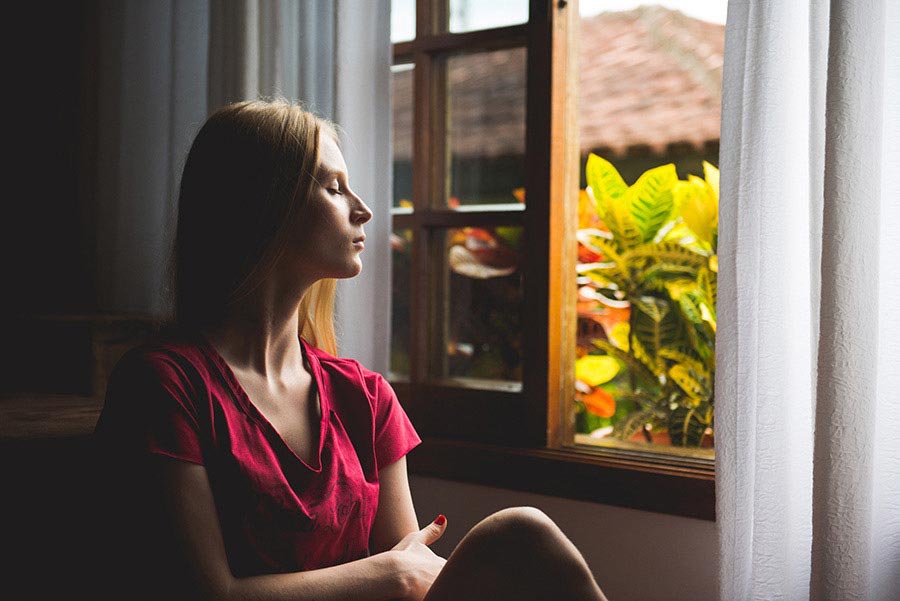 A woman looking out the window