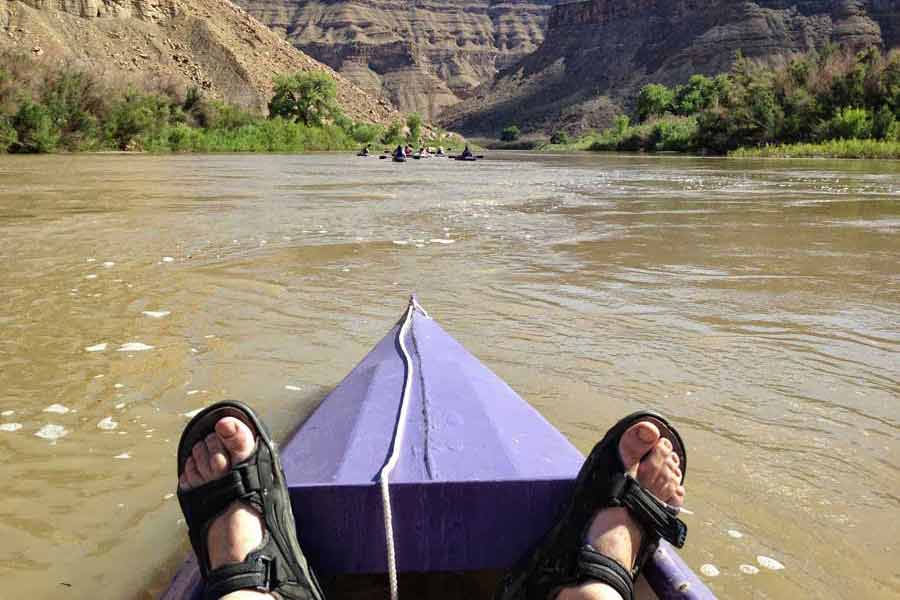 Floating down a river, reflecting on recent health challenges with chronic illness and leg fracture.